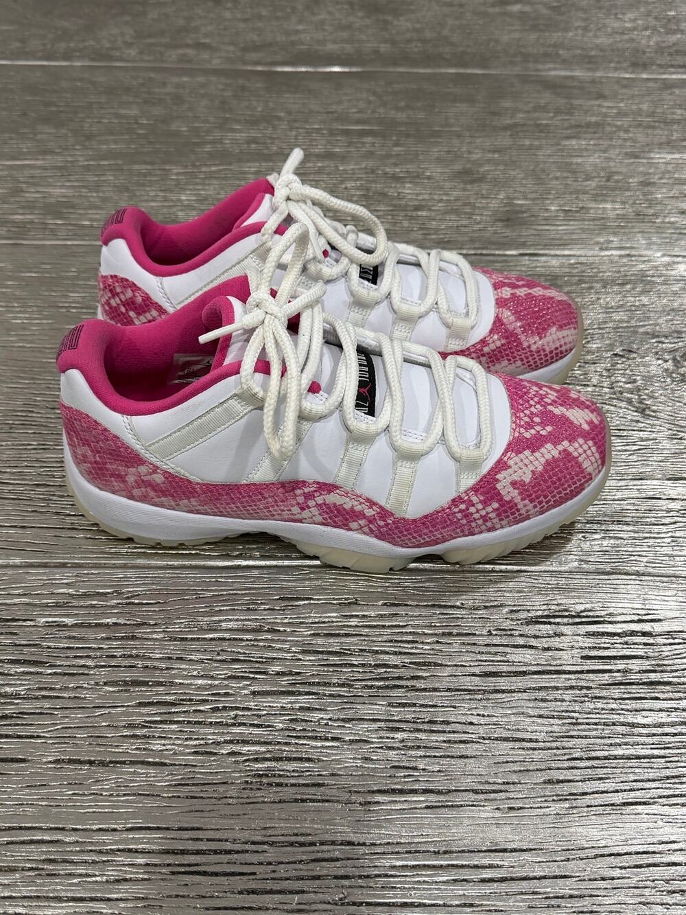 Air Jordan 11 Low “Pink Snakeskin”  women’s size 9.5